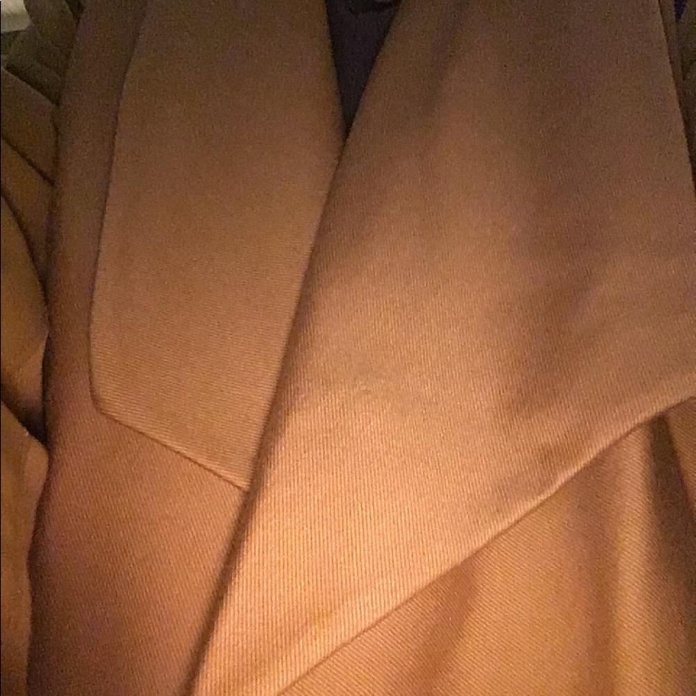 Size 18 women’s camel colored medium weight , waist length convertible jacket